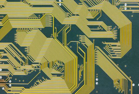 The electronic circuit board hi-tech green backgroundの写真素材