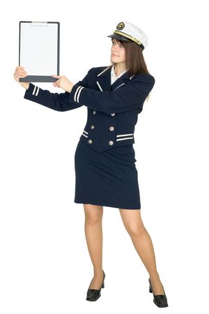 Beautiful woman in uniform sea captain with a tablet, isolated on a white backgroundの写真素材