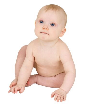 The baby sits isolated on a white backgroundの写真素材