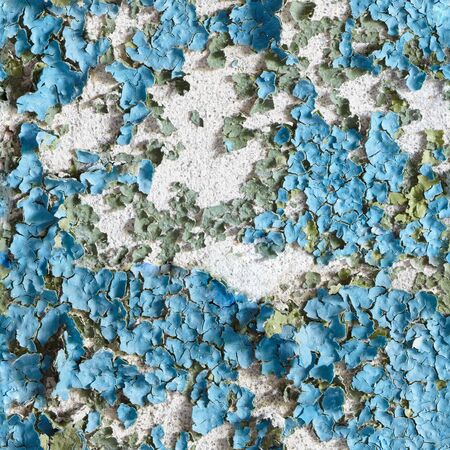 Seamless texture of the wall with peeling blue paintの写真素材