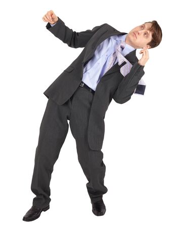 Businessman gets hit in the face, isolated on a white backgroundの写真素材