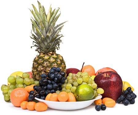 Artistic still life of pineapple and other fruits on whiteの写真素材