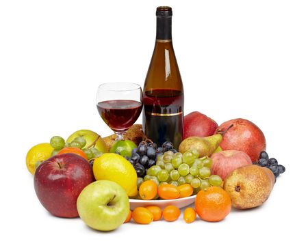A bottle of wine and a glass surrounded by fruit on whiteの写真素材