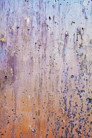 Rusty rough surface is covered with mudの写真素材