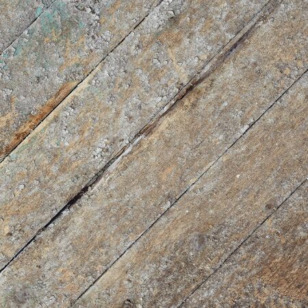 Dirty weather-beaten surface of the wooden wallの写真素材