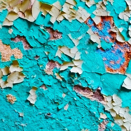 Significantly damaged the paint on the surface of the old wallの写真素材