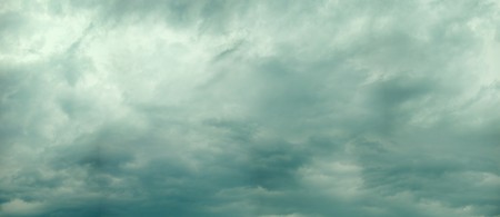 Panoramic photo of cloudy sky before the rainの写真素材