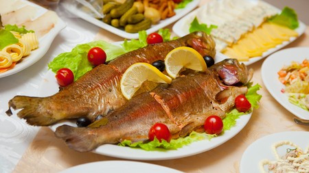 Dish of delicious fried fish on the tableの写真素材