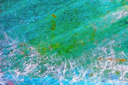 Old grunge blue wall with stains of fungus - backgroundの写真素材