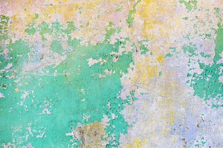 The old wall peeled off under the influence of moistureの写真素材