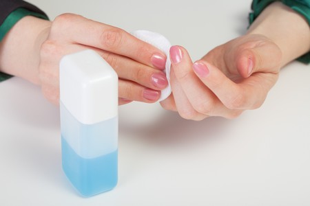 Procedure of care by nails - nail polish removalの写真素材