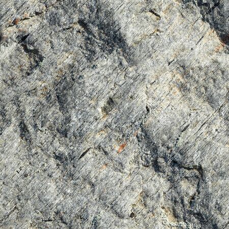 Surface of a raw rough stone - a seamless textureの写真素材