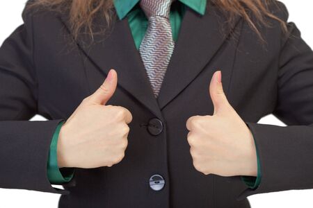 The woman gestures shows us the successの写真素材