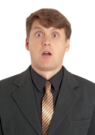 Extremely surprised businessman on white backgroundの写真素材