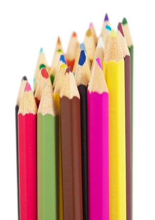 A set of colored wooden pencils isolated on a white backgroundの写真素材