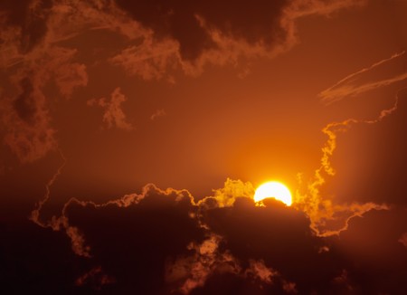 Sunset in cloudy weather - brightly orange shadesの写真素材