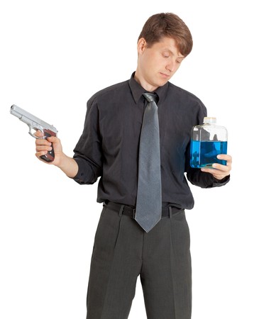 The person chooses a way of suicide - poison or a pistolの写真素材