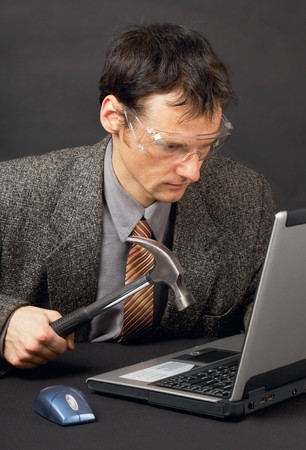 The person repairs the laptop as is ableの写真素材