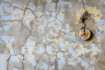 Background - an old wall in the thrown house with electroconducting fragmentsの写真素材