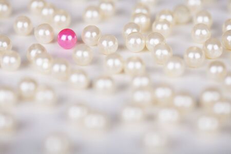 One lilac wrong pearl among set of the usualの写真素材