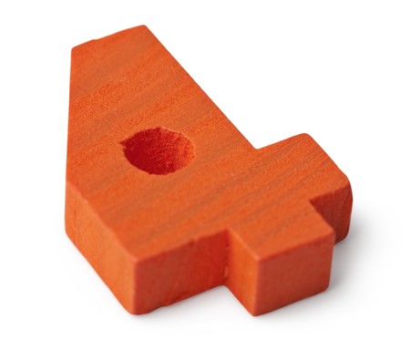 Orange wooden toy figure four on a white backgroundの写真素材