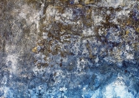 Old rough moldy plaster on a brick wallの写真素材
