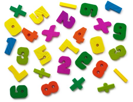 Numerous color toy figures on a white backgroundの写真素材