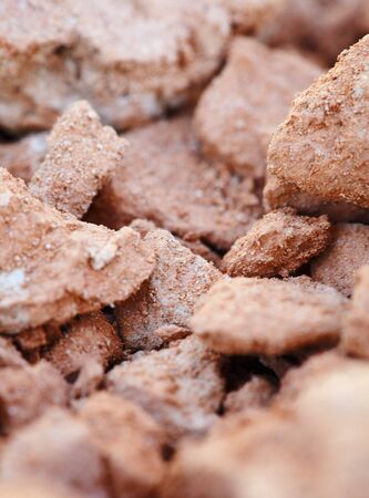 Dry brown potter's clay - some lumps close upの写真素材