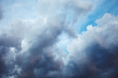 A dark cloudy night ominous sky - landscapeの写真素材
