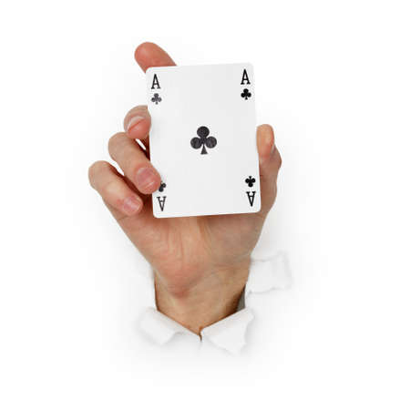 Hand holds the ace of clubs isolated on a white backgroundの写真素材