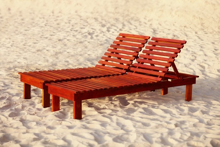 The beach belongs to relax - wooden sunbedの写真素材