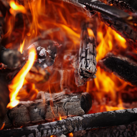 Wood burning in the fire - a square background