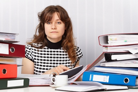 Tired woman - an economist on the workplaceの写真素材