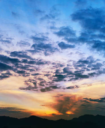 Sunset over the mountains, Thailand, Krabi, verticalの写真素材
