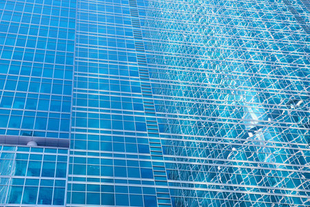 The walls and windows of a skyscraper - an abstract urban background
