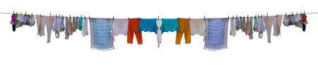 Underwear drying on a rope isolated on white background