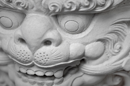 The stone head of an ancient Hindu deity from the island of Bali.の写真素材