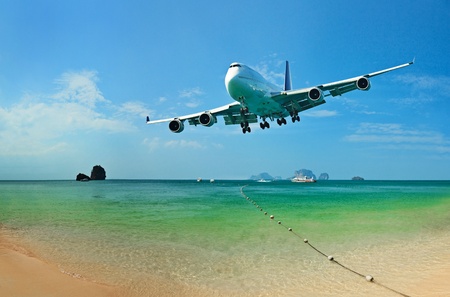 Traveling to the tropical countries by airplaneの写真素材