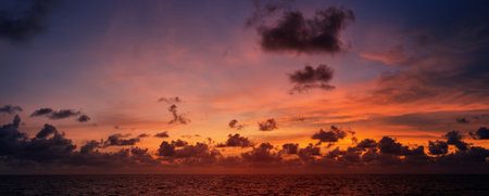 Picturesque beautiful panoramic view of the sky at sunset over tropical ocean