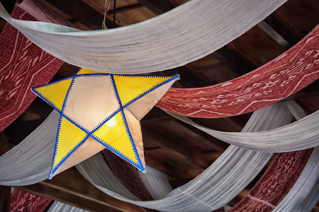 Luang Prabang, Laos - Decorations on the ceiling from fabric in the form of starsの写真素材