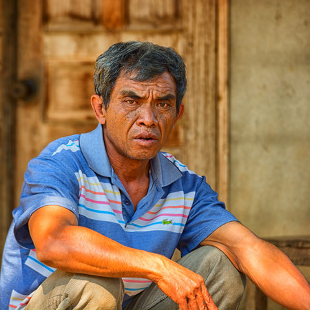 LUANG PRABANG, LAOS - CIRCA DEC 2013: Portrait of a local resident - an adult maleのeditorial素材