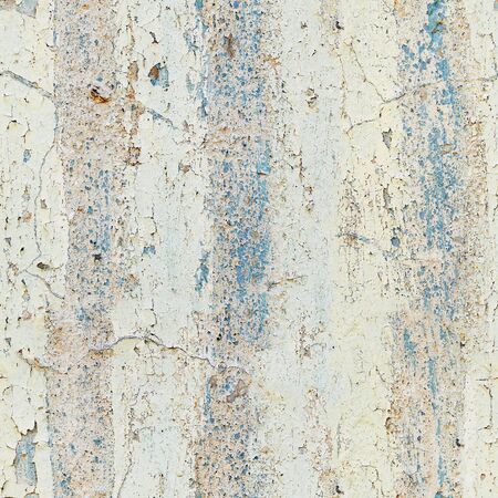 Old wall with peeling paint. Grunge material. Seamless pattern for designの写真素材