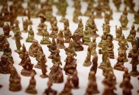 Jaisalmer, Rajasthan, India. Miniature bronze statuettes on the market counterの写真素材