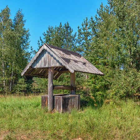 Vintage wooden well in the countrysideの写真素材