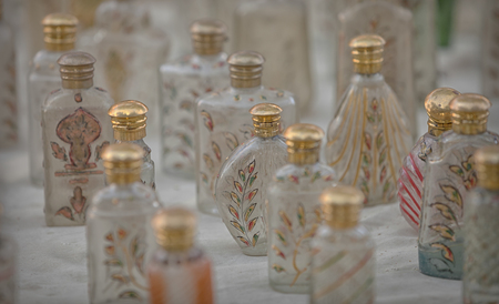 Small glass bottles for sale. The market in Indiaの写真素材