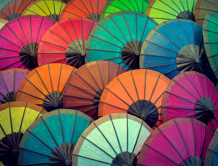 Laos, Luang Prabang. Retro umbrellas made of paper of different colorsの写真素材