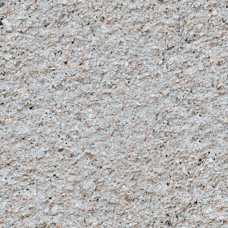 Background of crushed stone close up. Small stones background. Seamless pattern for designの写真素材