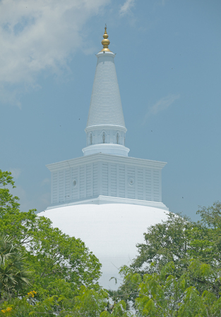 Sri Lanka, Anuradhapura - Ruwanwelisaya with trees before itの写真素材
