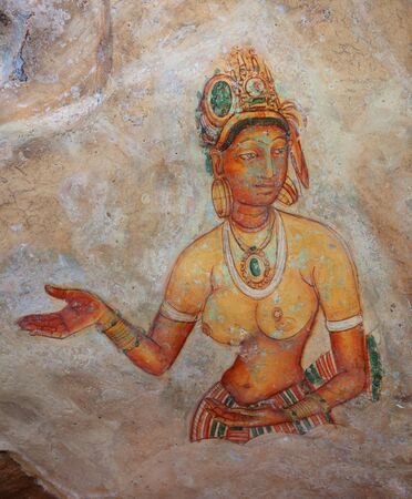 SIGIRIYA, POLONNARUVA, SRI LANKA - CIRCA APR 2013: An ancient fresco on the surface of the rock. A young woman in a rich outfitのeditorial素材