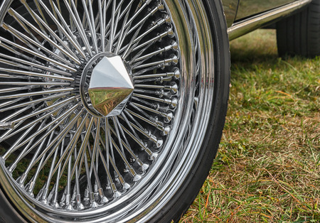 Wheel of an old sports car. Close up of the wheelの写真素材